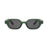 Lunettes de soleil octogonales vert translucide avec des verres gris foncé, offrant un style moderne et une protection UV optimale pour les yeux.